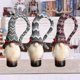 thumbnail image 3 of ZHAOCHENG Adornos navideños de gnomos, cubiertas para botellas de vino, 3 piezas, adornos navideños de gnomos hechos a mano, 3 of 5