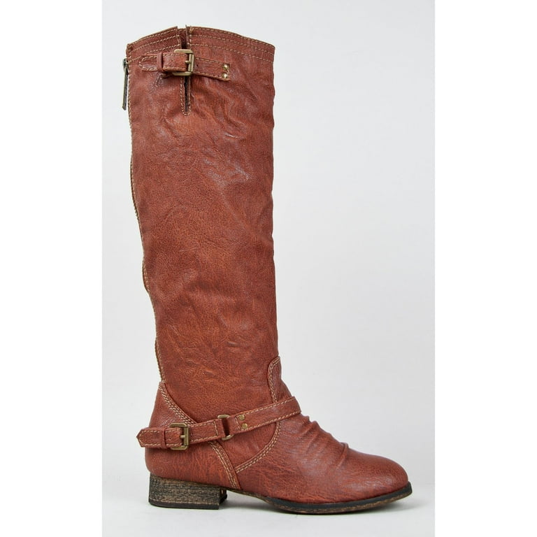 Tall brown boots top with red zipper