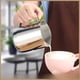 thumbnail image 2 of Taza de leche con forma de boca puntiaguda, taza de leche, taza de cera con escala cilíndrica, taza de cera para derretir, taza de acero inoxidable con forma de guirnalda, 2 of 5