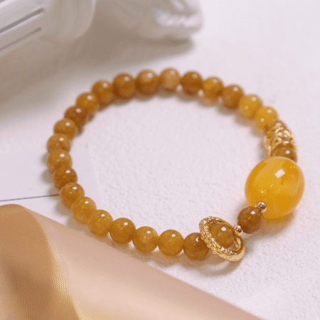

HYYANGUWENTI Sophisticated Stylish and Timeless Unisex Caramel Amber Bracelet - Perfect All-Season Accessory for Elegance and an Ideal Gift