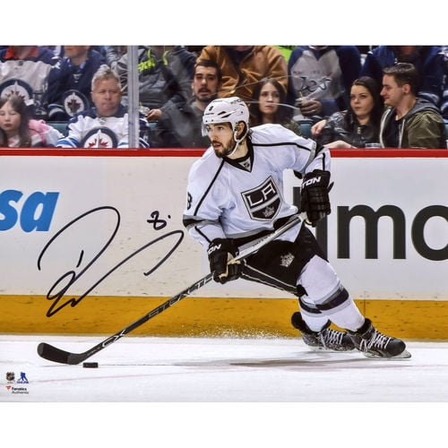 Drew Doughty Los Angeles Kings Autographed 8" x 10" White Jersey Skating With Puck Photograph No Size by Fanatics Authentic