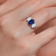 thumbnail image 4 of Gem Stone King 10K White Gold Blue Created Sapphire White Moissanite and White Lab Grown Diamond 3 Stone Engagement Ring for Women (2.64 Cttw, Gemstone Birthstone, Available in Size 5, 6, 7, 8, 9), 4 of 5