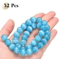thumbnail image 3 of Uxcell 32pcs Blue Cat's Eye Stone Beads 12mm Round Smooth Gemstone Crystal Loose Bead for Jewelry Making Bracelets Necklace Earrings DIY, 3 of 7