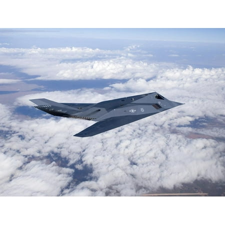 An F-117 Nighthawk Stealth Fighter in Flight Over New Mexico Print Wall Art By Stocktrek Images