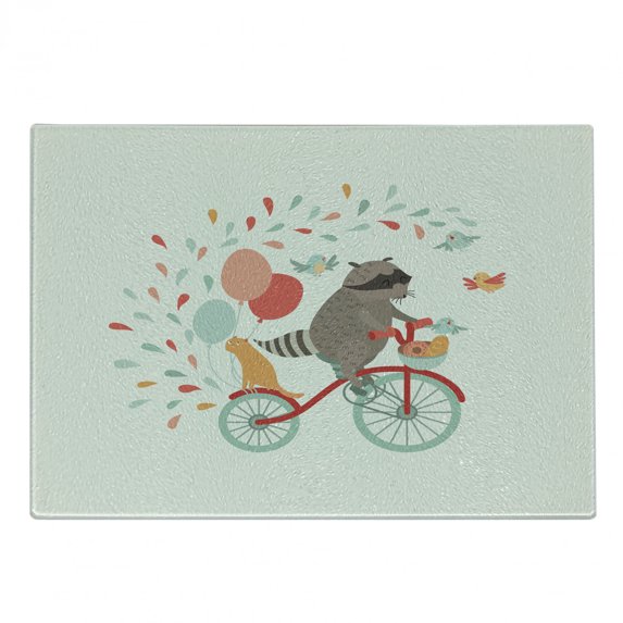 Cartoon Cutting Board, Happy Raccoon Riding a Bicycle with Cat Balloons and Birds on Teardrop Background, Decorative Tempered Glass Cutting and Serving Board, Small Size, Multicolor, by Ambesonne