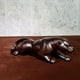 thumbnail image 3 of Rosewood carving is booming, featuring leopard-themed handicrafts, figurines, and home decor items made of mahogany., 3 of 3