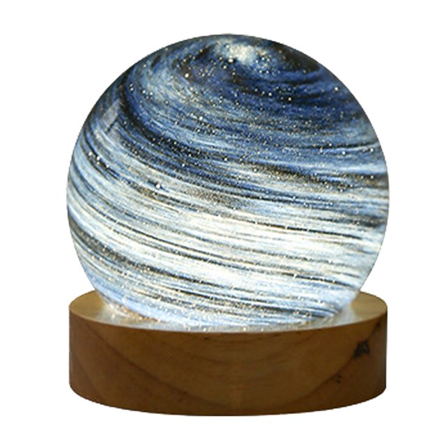 Una variedad de luces de planeta de vidrio, luces de noche de ensueño con forma de planeta arcoíris para la mesita de noche.