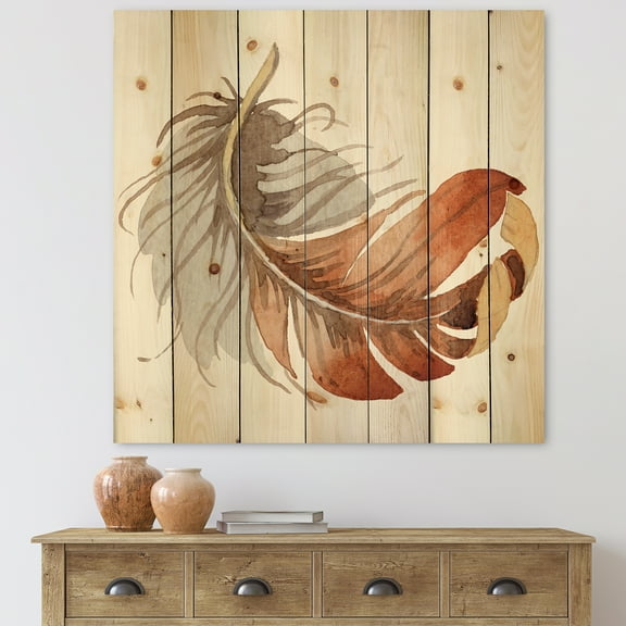 Designart 'Orange Ethnic Bird Feather On White' Bohemian & Eclectic Print on Natural Pine Wood