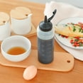 thumbnail image 6 of Leakproof Kitchen Squeeze Bottles with Measurement Markings - BPA-Free, Dishwasher-Safe Condiment Dispenser for Cooking, Baking, Grilling - 2 Sizes w/ Interchangeable Lids for Oils, Sauces, Syrups, 6 of 7