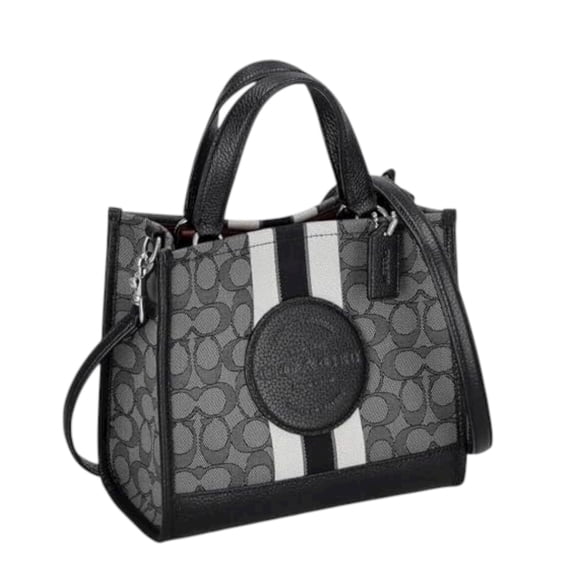 Bolsa Coach dempsey color negro chica