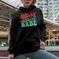 thumbnail image 2 of Holly Jolly Babe, Christmas or Winter Season Themed, Groovy Retro Wavy Text Merch Gift, Black Hooded Sweatshirt or Hoodie, 2XL, 2 of 5