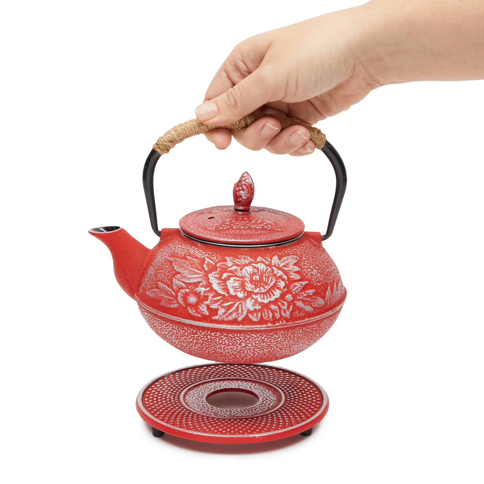 Tetsubin Cast Iron Tea Pot, brewing some Jasmine. Never used a cast iron tea  pot, the little placard that came with the set claims it can be used over a  fire. If