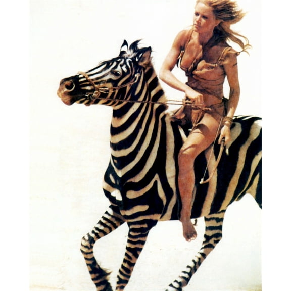 Tanya Roberts as Sheena Queen of the Jungle riding wild zebra 11x17 inch Poster