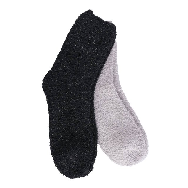 calceta cozy polo club para mujer, diseño con brillos liso negro con blanco 2 pares unitalla — dos calcetines mullidos para mujer, un par negro con hilos brillantes y un par blanco gris claro esponjoso; corte tobillo y ajuste unitalla visibles en vista cenital sobre fondo blanco; también suelen usarse como calcetines de descanso en casa.