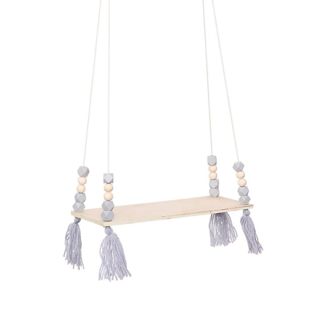 1 estante colgante con borlas.