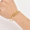 thumbnail image 3 of Brazalete Pulsera Ryscom Forma de Espiral con Dije de Corazon Color Dorado Acero Inoxidable, 3 of 5