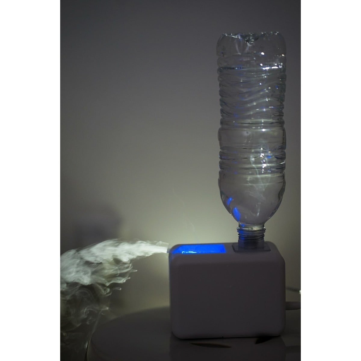 Xbrand Portable Mini Car & Travel Cool Mist Humidifier w/ Blue LED Light, 3 Inch Tall