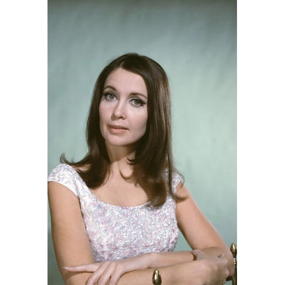 Anjanette Comer 1960's studio portrait in white dress seated on chair 24x36 Poster