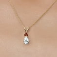 thumbnail image 3 of Gem Stone King 14K Yellow Gold White Created Sapphire and Red Garnet Pendant Necklace for Women | 1.11 Cttw | Gemstone September Birthstone | Pear Shape 7X5MM | With 18 inch Chain, 3 of 6