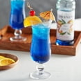 thumbnail image 2 of Monin Premium Blue Curacao Syrup, Electric Orange Peel & Citrus Mixer, 750 mL (25.4 oz) Glass Bottles, Professional Bulk Case of 12, 2 of 5