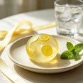 thumbnail image 5 of Lemon Squishy Squeeze Toy, Transparent Plastic Ball With Embedded Slice for Tactile Hand Fidget Play, 5 of 6