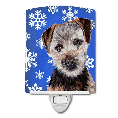 

Caroline s Treasures SC9783CNL Norfolk Terrier Puppy Winter Snowflakes Ceramic Night Light 6x4x3 multicolor