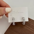 thumbnail image 1 of Pendientes de circonita de lujo de luz fría de alta calidad en línea, pendientes de nicho de diamantes llenos populares, diseño de temperamento, pendientes pop, diseño de cruz, 1 of 6