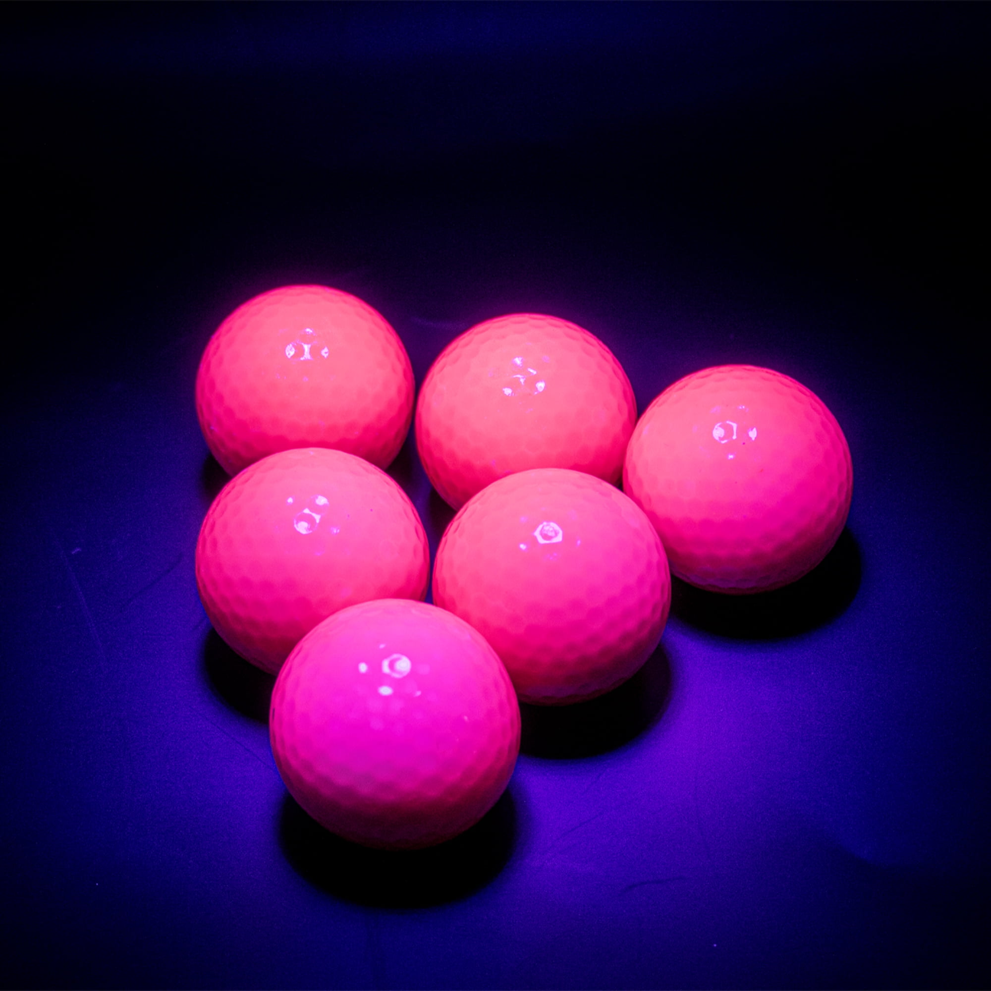 Blacklight Pink Golf Balls 12 Pack by GBM Golf