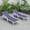 Blue, variant on LeisureMod Marlin Poolside Outdoor Patio Lawn and Garden Modern White Powder Coated Aluminum Frame Suntan Sling Chaise Lounge Chair with Armrests, Set of 2 (Green)
