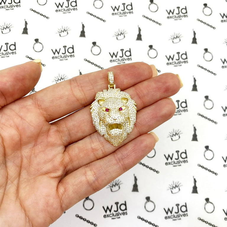Gold lion pendant with ruby eyes deals