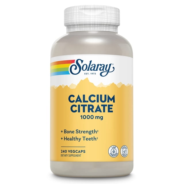 suplemento de calcio solaray citrato de calcio 1000 mg 240 vegcap botella frontal con etiqueta amarilla y logo Solaray, texto 'CALCIUM CITRATE 1000 mg' y '240 VEGCAPS' en envase transparente con tapa blanca; también usado a menudo para llevar cápsulas de viaje en estuche pequeño.
