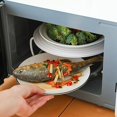 thumbnail image 1 of Rejilla para calentar alimentos en microondas con capas para cocinar al vapor, plegable, redonda, de doble capa, superior e inferior, antideslizante, para almacenar alimentos en microondas, 1 of 6