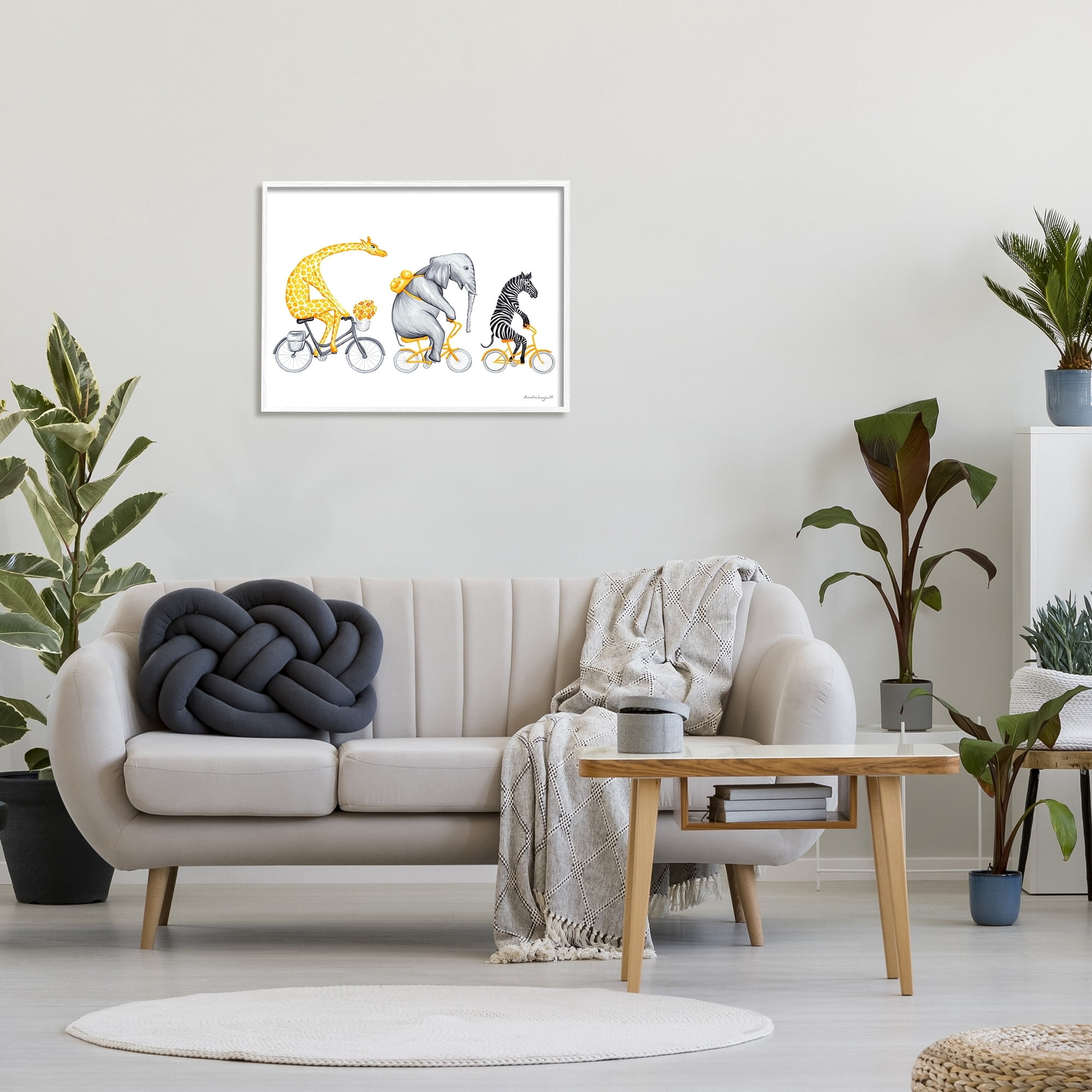 Stupell Industries Savanna Animals Riding Bikes Bicycles Yellow Accent Graphic Art White Framed Art Print Wall Art, Design by Amelie Legault