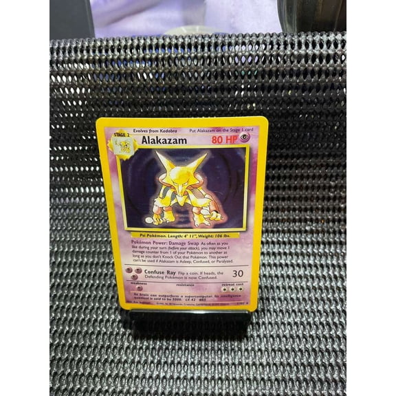 Collectible 1999 Base Set Alakazam Holo Rare 1/102 Wizards of the Coast Pokémon English