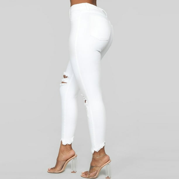 White skinny jeans with cheap holes