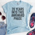 thumbnail image 2 of 20 Years Into This Awkward Phase Shirt, Unisex Women's Men's Shirt, Birthday Shirt, Bday Tee, 20th Birthday, Heather Light Blue, Medium, 2 of 6