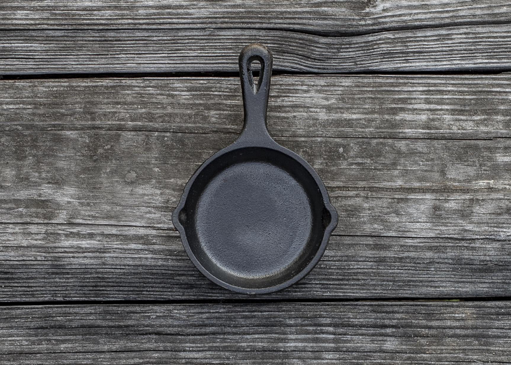 Lodge 10.25 Inch Cast Iron Pre-Seasoned Skillet – Signature Teardrop Handle  - Use in the Oven, on the Stove, on the Grill, or Over a Campfire, Black