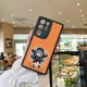 thumbnail image 2 of ¡Mejora la protección de tu iPhone con esta duradera y llamativa funda para teléfono con estampado de dibujos animados!, 2 of 4