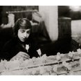 thumbnail image 2 of 15 years old racking flowers at the Beston Floral Supply Co. Poster Print (18 x 24), 2 of 4