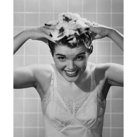 Young woman shampooing her hair Canvas Art - (18 x 24)