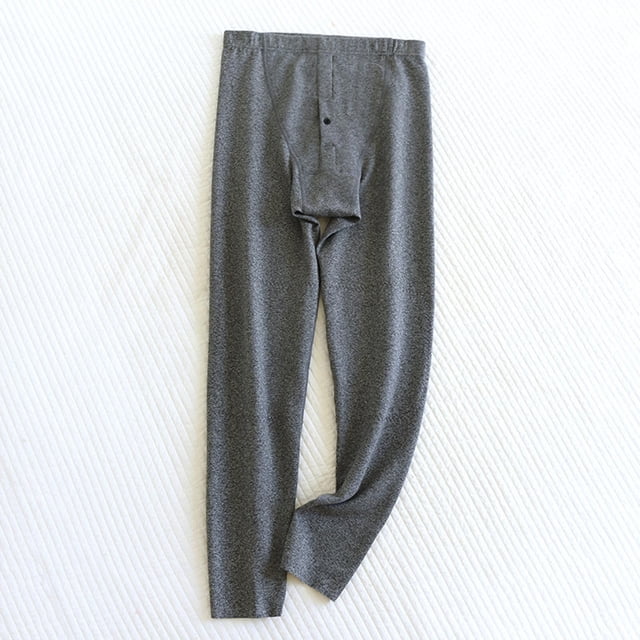 Pantalones de dormir de color liso a la moda para hombre, pantalones cortos holgados, pijamas largos, pijamas de poliéster para hombre.
