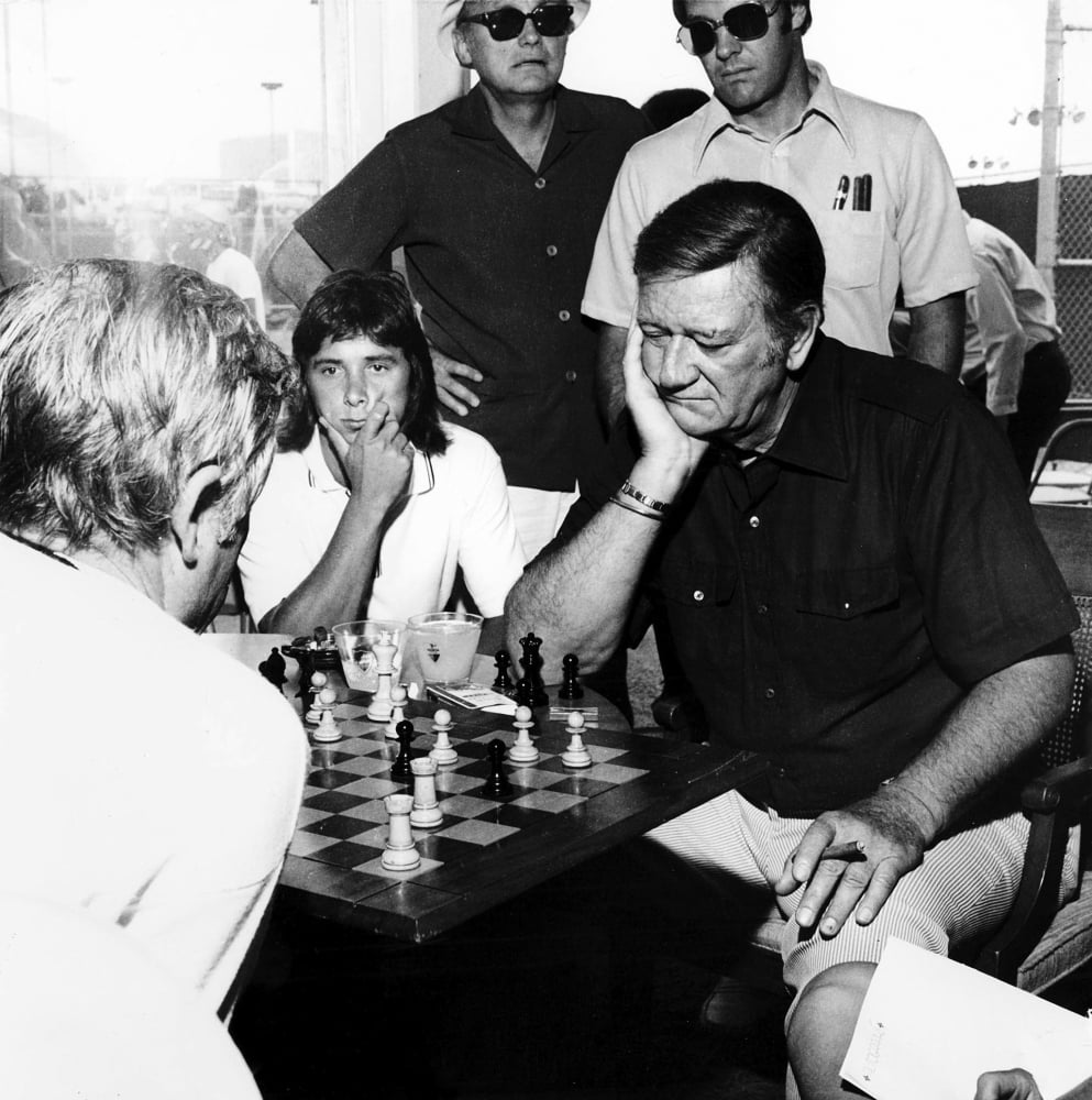 John Wayne playing chess Photo Print (8 x 10)