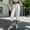 White, variant on Women’s Faux Leather Capri Pants Elastic High Waist with Zipper & Button Closure, Loose Straight Wide Leg Cropped Trousers with Pockets White