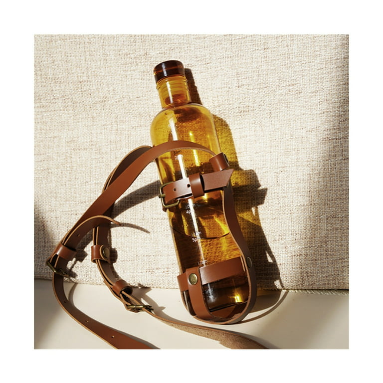 Leather water bottle holder with strap and glass bottle