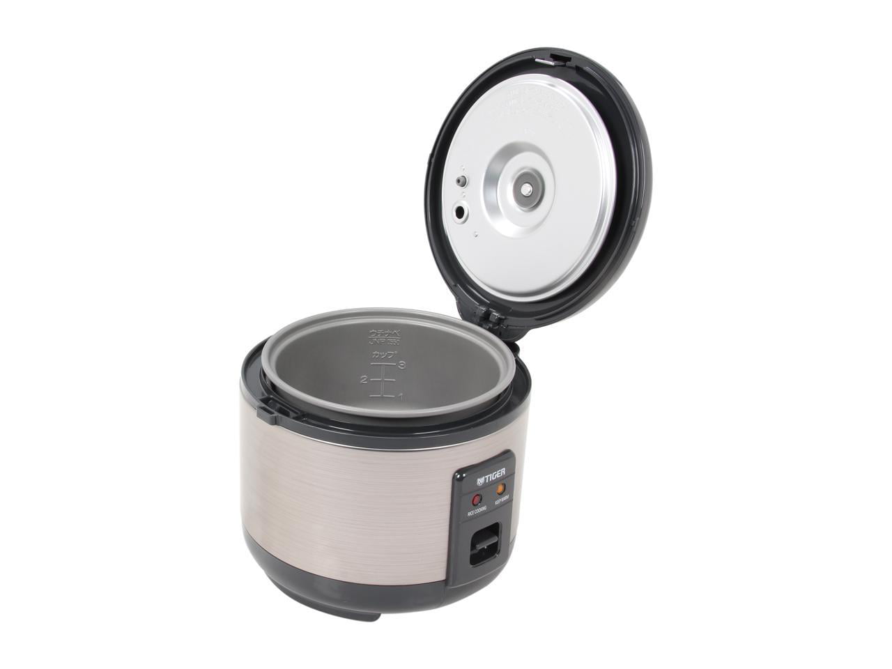 TIGER 10 CUP ELECTRIC RICE COOKER WARMER. KEEP WARM A MAXIMUM OF 12 HOURS.  INCLUDES STEAM BASKET, SPATULA, AND RICE MEASURING CUP. 