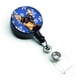 thumbnail image 1 of ""Caroline'S Treasures Min Pin Winter Snowflakes Holiday Carrete Retráctil Para Insignia Multicolor (Lh9290Br)"", 1 of 3