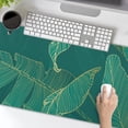thumbnail image 3 of Tropical Leaf Mouse Pad 35.4 X 15.7 Inch XXL Green Gold Banana Leaf Print Full Desk Mousepad Extended Large Non-Slip Rubber Base Keyboard Mat with Stitched Edges for Gaming Office, 3 of 5