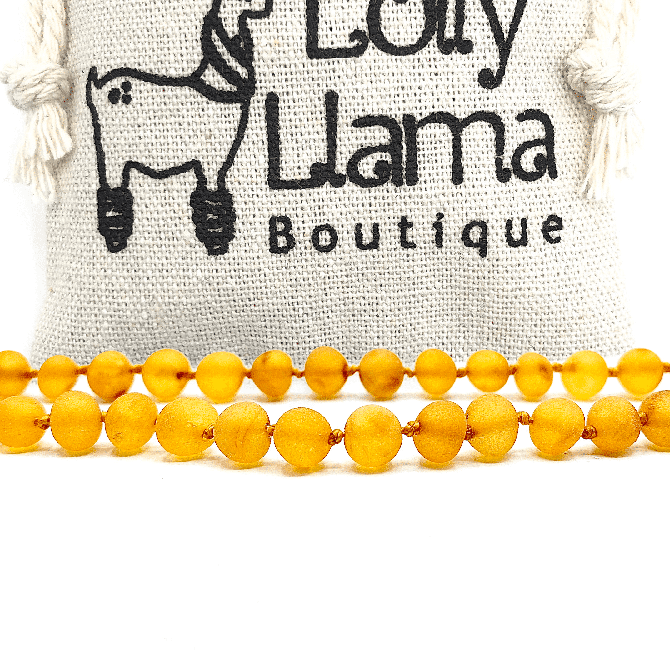 lolly llama amber teething necklace