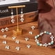 thumbnail image 4 of 1 caja de 60 piezas de cuentas de crucifijo a granel, de piedra turquesa, blancas, con ojos turcos negros, amuletos de Pascua, mini cuentas espaciadoras., 4 of 5