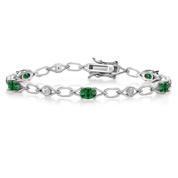 Gem Stone King 925 Sterling Silver Green Created Emerald and Round White Lab Grown Diamond Tennis Bracelet for Women (2.14 Cttw, Gemstone Birthstone, Oval 6X4MM, 7.25 inches)